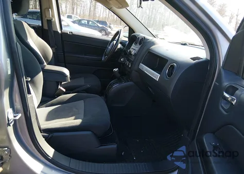 2015 Jeep Compass Sport z USA, uszkodzony, nr VIN 1C4NJCBA8FD156623